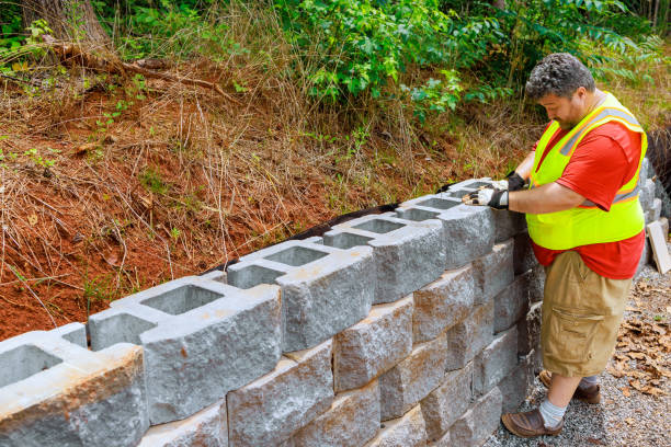 istock Securin concrete block to retaining wall was an essential of the construction process. 1526350865