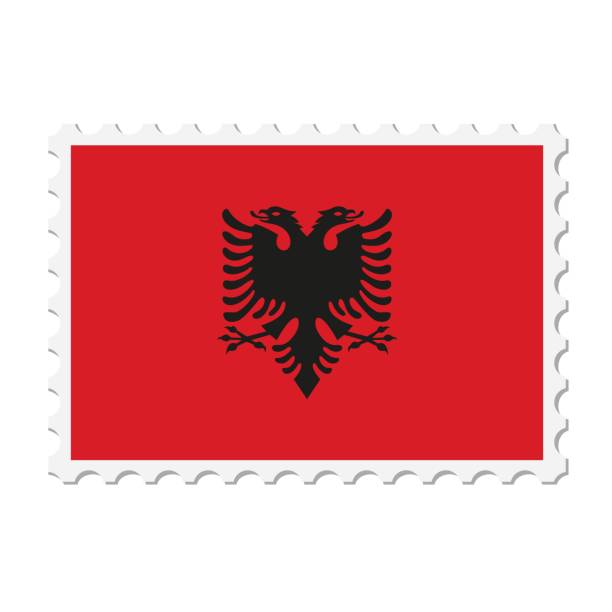 istock Albania postage stamp. Postcard vector illustration with Albanian national flag isolated on white background. 1526382768