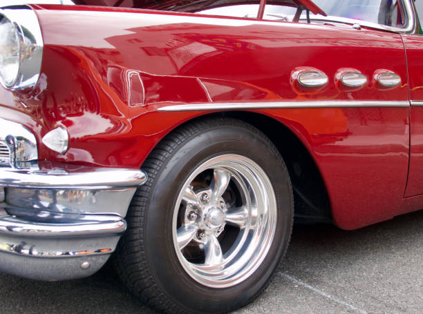 istock Front driver’s fender on a bright red sports car 1526467678