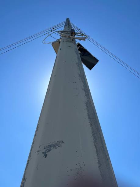 istock Huge electrical tower with the sun shining behind it. 1526576169