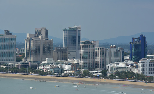 Buildings in the city full of condos and hotels. high angle photo in pattaya\nCaptured on July 8, 2023 in Pattaya, Thailand.