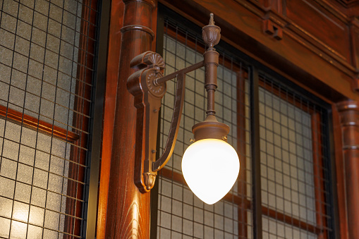 Ticket office and lighting fixtures with the warmth of wood