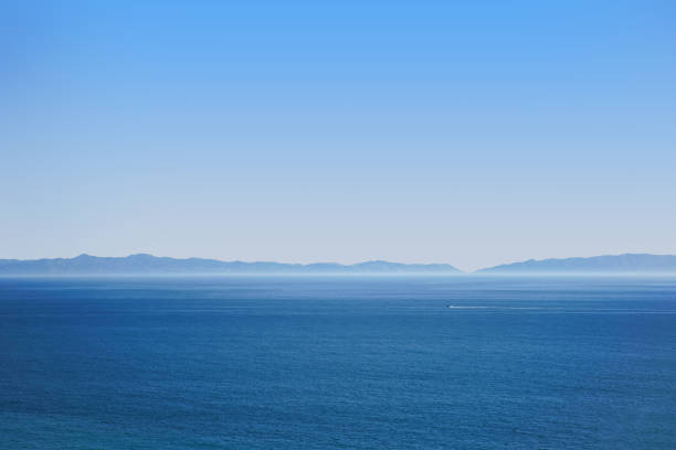 istock Hazy Ocean view with a boat in the distance 1526764574