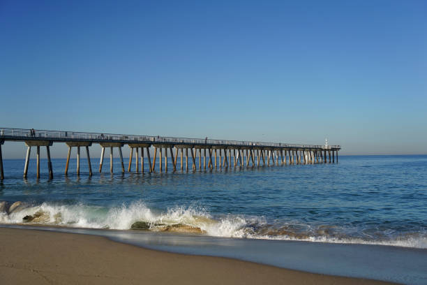Pier on the ocean in the morning stock photo