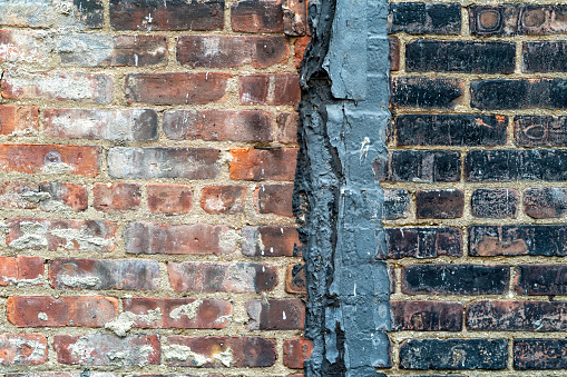 Od brick wall with fire damage