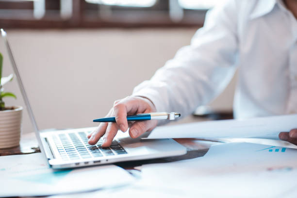 istock Hand businessman signing contract. 1526890038