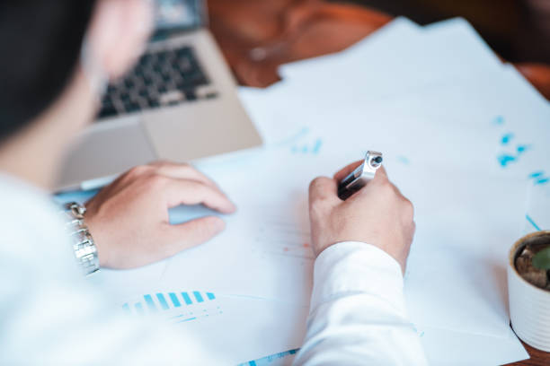 istock Hand businessman signing contract. 1526896530