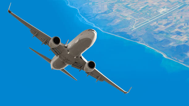 istock White Passenger plane fly up over take-off runway 1526995762