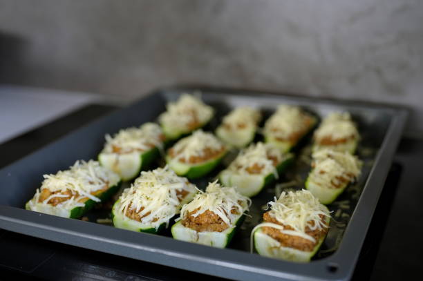 istock Raw zucchini stuffed with minced meat 1527004782