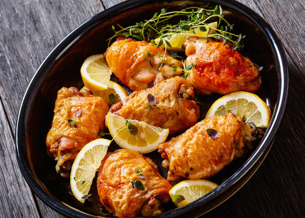 istock roast chicken thighs with lemon, thyme and spices 1527012718
