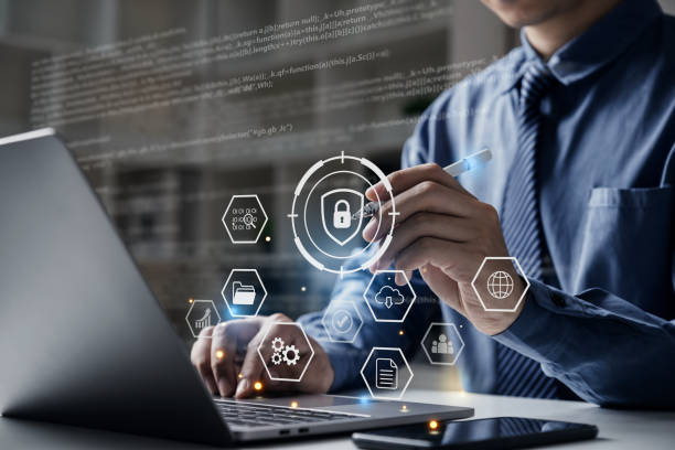 istock Businessman working on laptop with cyber security network 1527020370