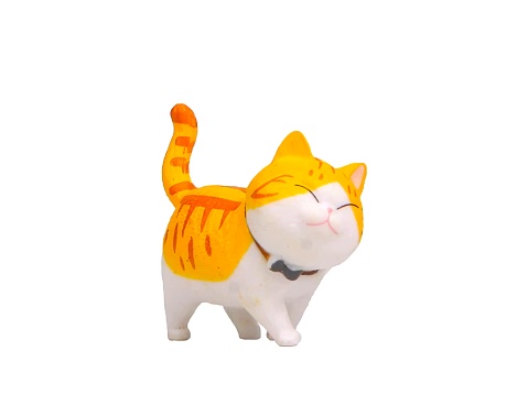 A lifelike papier mache sculpture of a cat, beautifully crafted with intricate details. The cat is placed on a clean white background, providing ample copy space for any design or text.