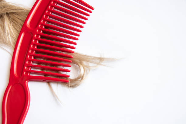 Red comb isolated on white background