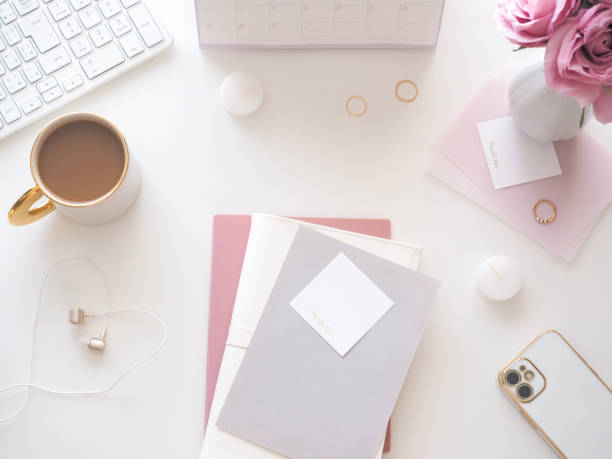 istock Flat lay top view of white pc desk, feminine workspace image 1527124399