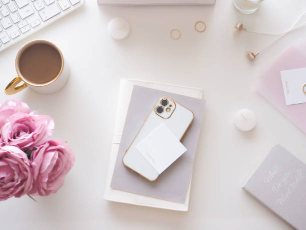 istock Flat lay top view of white pc desk, feminine workspace image 1527124402