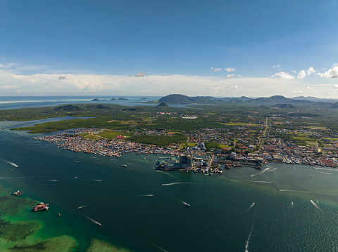 Aerial view of town of Semporna, located by the sea, is a popular place for tourists. Borneo, Sabah, Malaysia.