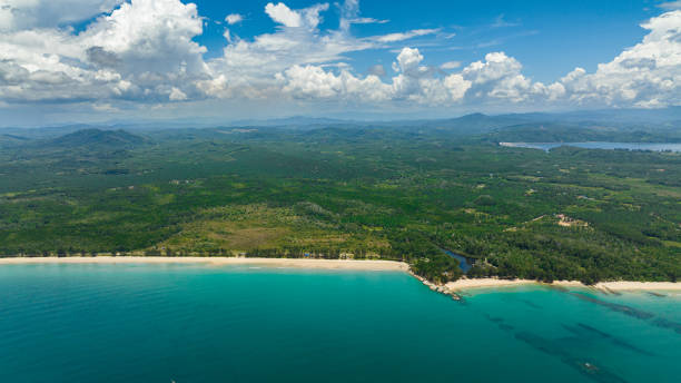 istock Tropical sandy beach and blue sea. Borneo, Malaysia. 1527143070