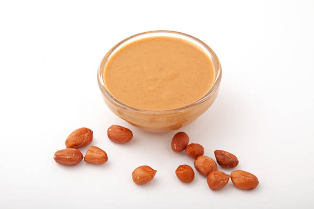 istock Bowl of creamy peanut butter with nuts 1527154542