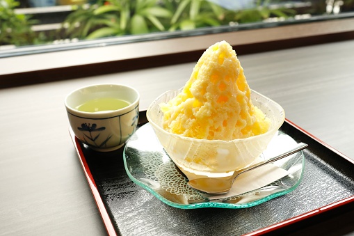 Orange milk-flavored shaved ice. A classic Japanese summer treat.