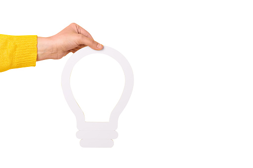 hand holding light bulb symbol isolated on white background