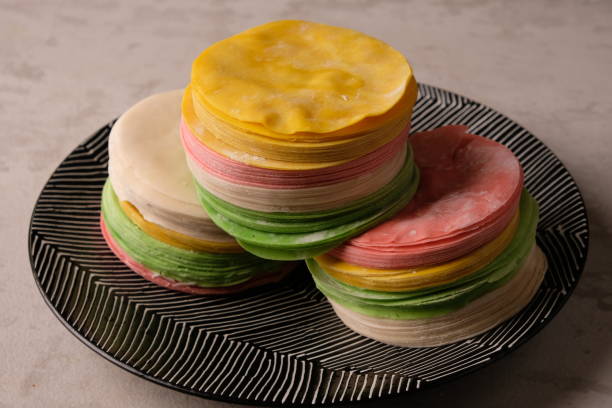 istock pile of dimsum skins on a ceramic plate. 1527230165
