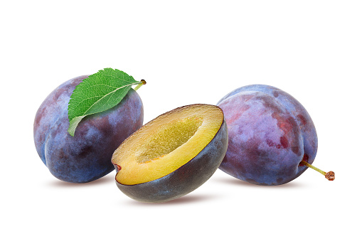 Plums with leaf isolated on white background  with clipping path
