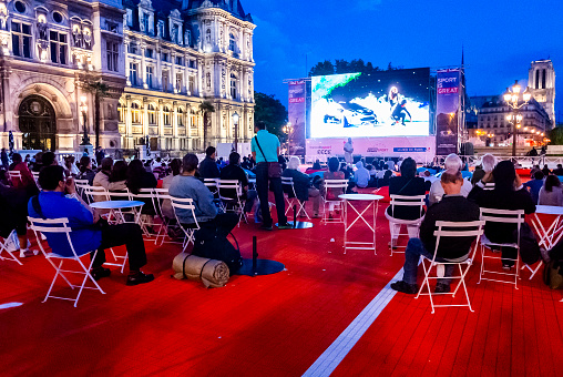 Paris, France, July 28, 2012, Crowd People, Tourists Relaxing at Paris Café, Day, Terrace , Place de l'Hotel de Ville, Watching Olympic Games on Public Screen on Plaza, Night
