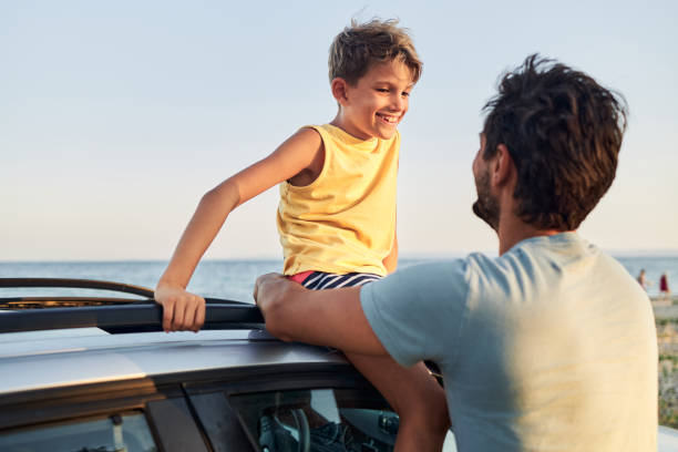 istock Father and son enjoying summer vacation 1527299371