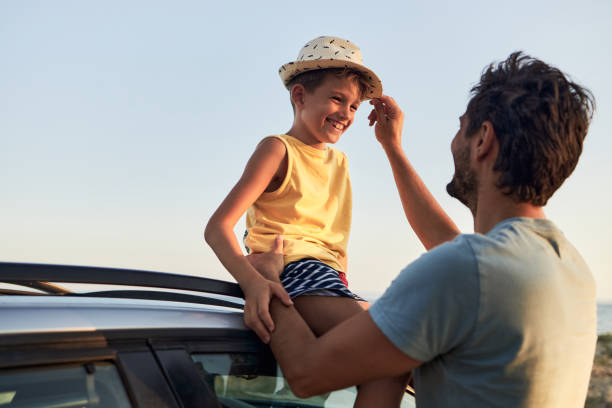 istock Father and son enjoying summer vacation 1527299884