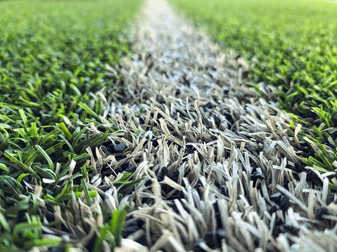 Artificial grass football field background
