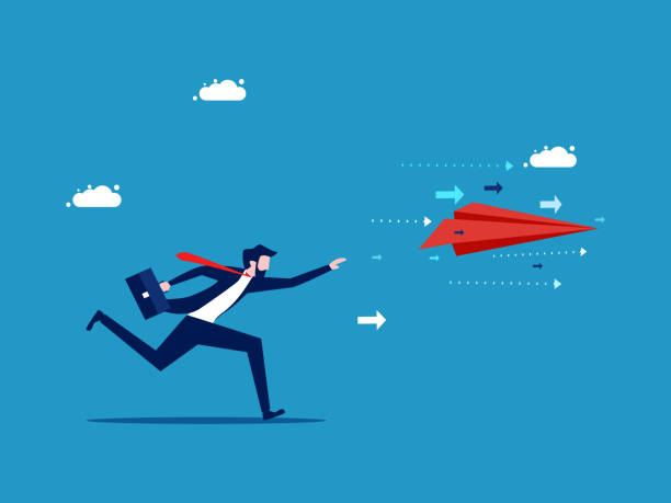 istock Leadership and progress. Businessman runs and grabs a paper plane 1527429559