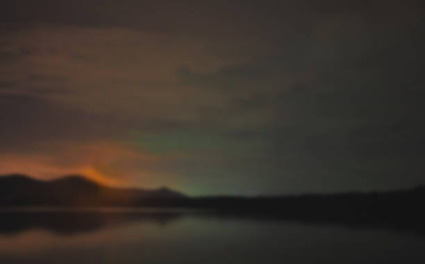 istock Abstract blur background of twilight dramatic sky on the beach 1527431719