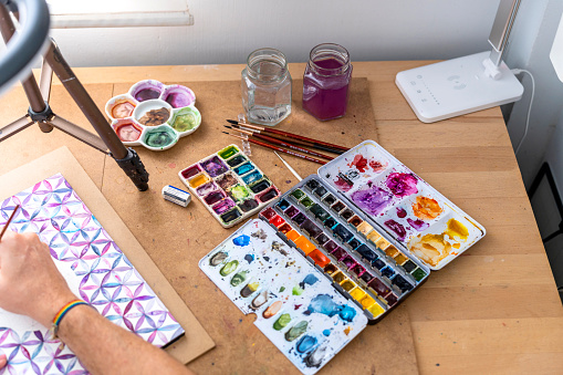 Masterful Strokes: LGBTQ+ Watercolor Artist Demonstrating Skill and Talent