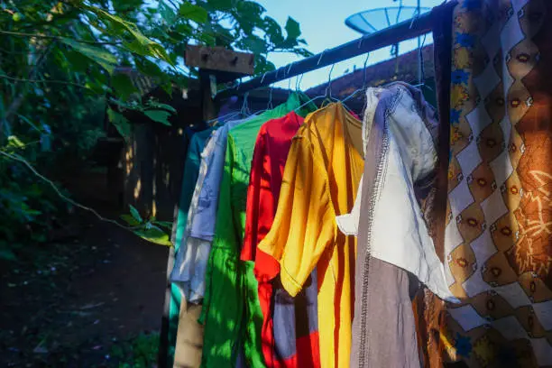 Photo of Stock photo view of clothes being dried on top of a house