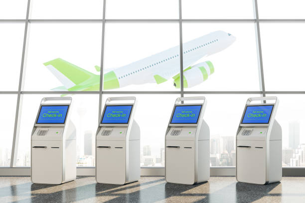 istock Airport self service check in kiosks and airplane 1527607361