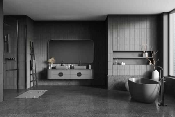 istock Grey bathroom interior with bathtub, double sink and douche, accessories 1527608556