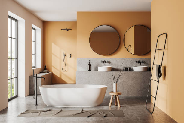 istock Orange bathroom interior with tub, double sink and shower 1527623538