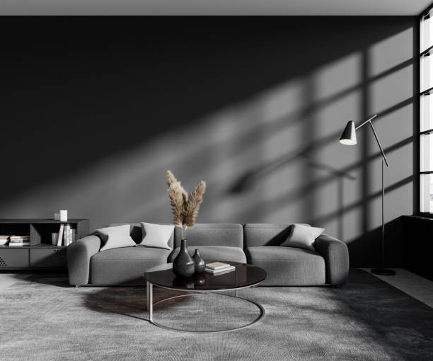 istock Grey living room interior with couch and coffee table, window. Mockup wall 1527631513
