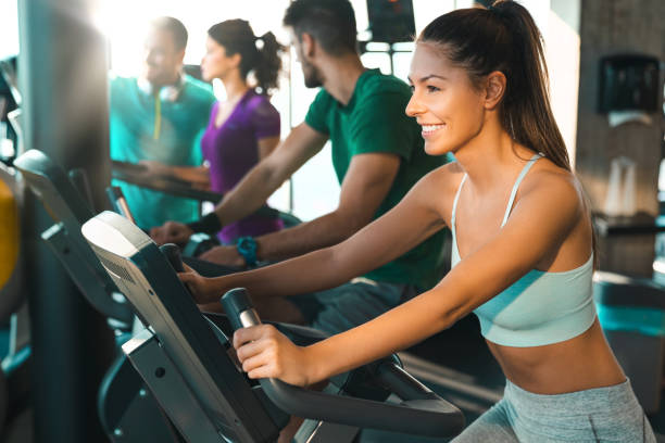 istock Happy young female feeling determined on a exercising class in a gym 1527646498
