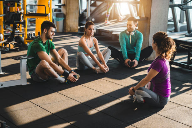 istock Four young friends doing stretching exercises 1527652400