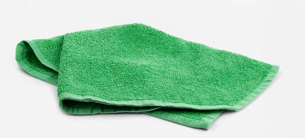 istock Isolated green kitchen towel. Food decor.dish cloth. 1527709044