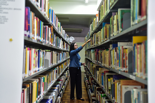 Student doing research in the library