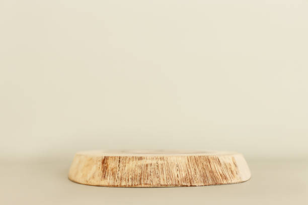 istock Wooden board over pastel color background. For cosmetics, aesthetics, and objects mockup 1527737956