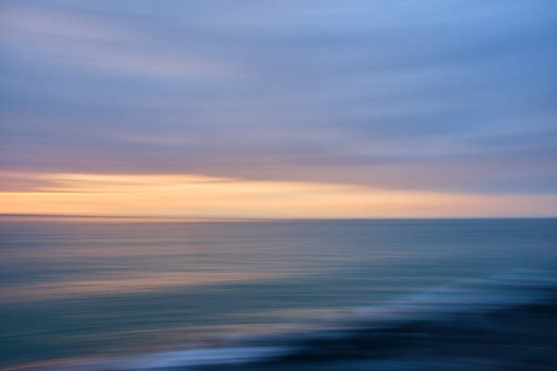 istock Abstract intentional camera movement shot at the sea in the sunset 1527765151
