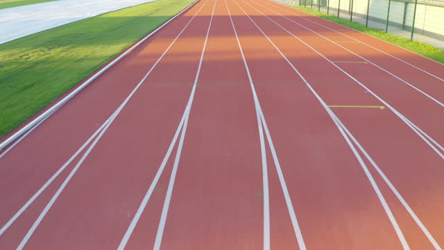 Starting block and starting line of the athletic track, drone shot