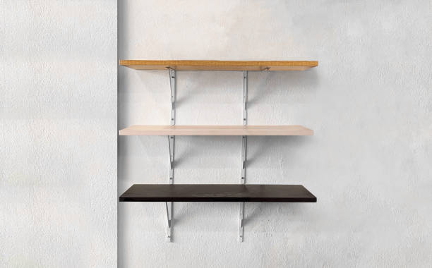 istock Floating wood three shelf on the wall. 1527868880
