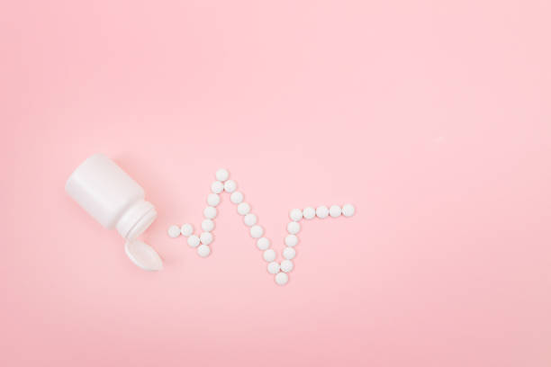 istock Heartbeat Rhythm. ECG Line Made from White Pills. Pharmaceutical Industry 1527869039