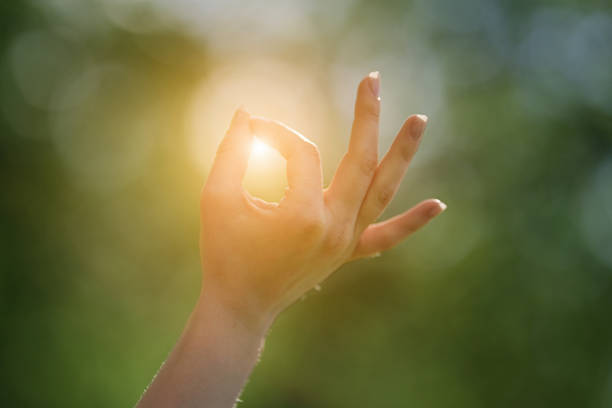 istock Close up of hand in a meditation pose 1527892418