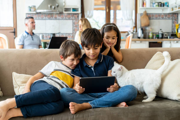 istock Two boys watching a movie on a tablet 1527900203
