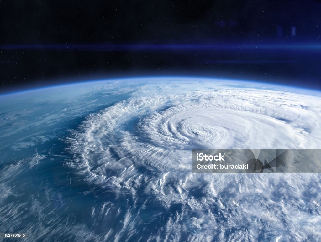 Planet Earth in the space. Blue Earth in the space. Hurricane seen from the space over planet Earth. Storm, hurricane, typhoon - concept cataclysm. Elements of this image furnished by NASA.______ Url(s): https://photojournal.jpl.nasa.gov/catalog/PIA17257   https://www.nasa.gov/image-feature/hurricane-florence-as-it-was-making-landfall-0 Hurricane - Storm Stock Photo